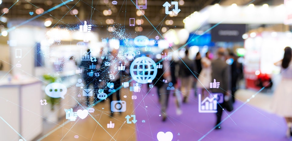 ecommerce icons over a background image of a WooCommerce conference