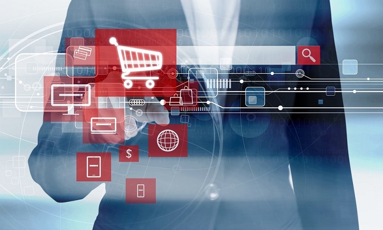 Businessperson interacting with a futuristic digital interface with e-commerce icons like a shopping cart, payment, and global connectivity symbols.