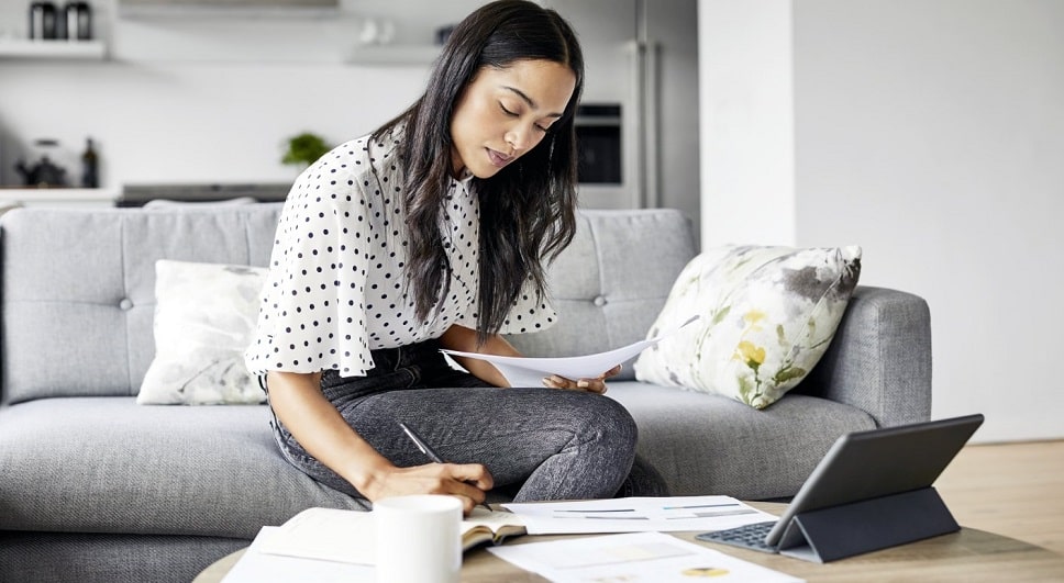 Lady working at table with computer