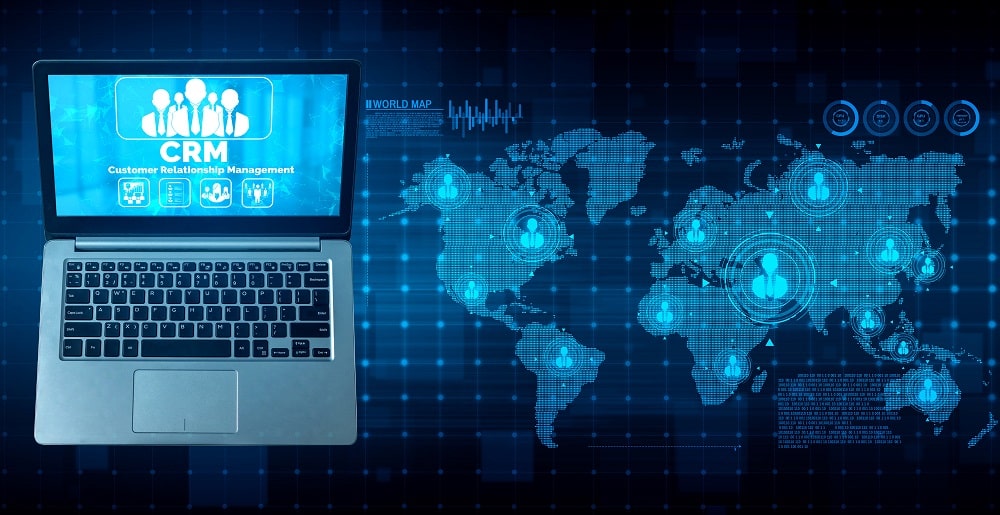 laptop connected to a map of the world