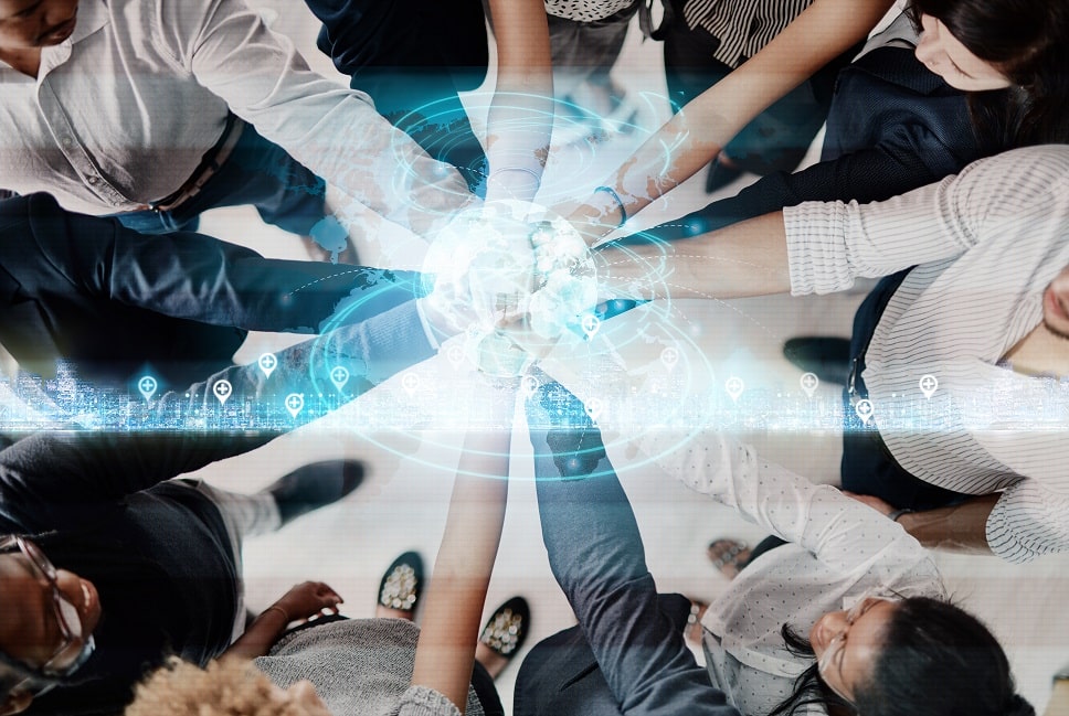 Coworkers working together on a full digital transformation