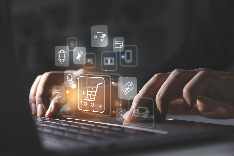 Person shopping online using laptop, indicating successful web development for enterprise ecommerce BigCommerce websites