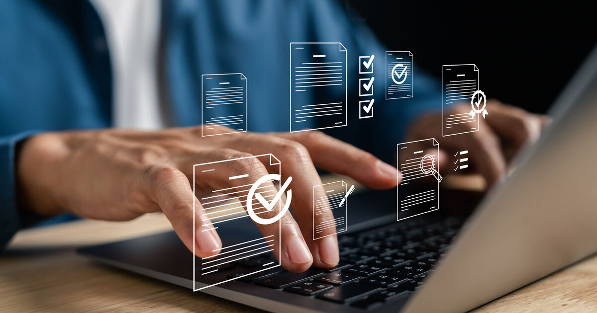 Person on a laptop with digital icons representing content management systems, digital experience platforms, and ecommerce.
