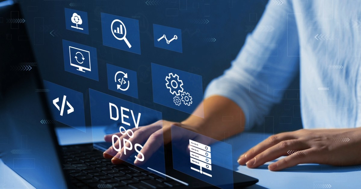 Professional on a laptop, discovering how cloud automation for continuous delivery with AEMCS can accelerate DevOps success