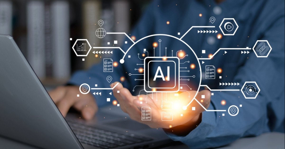 Business professional using laptop, interacting with AI for automation, analytics, digital transformation, and marketing ROI