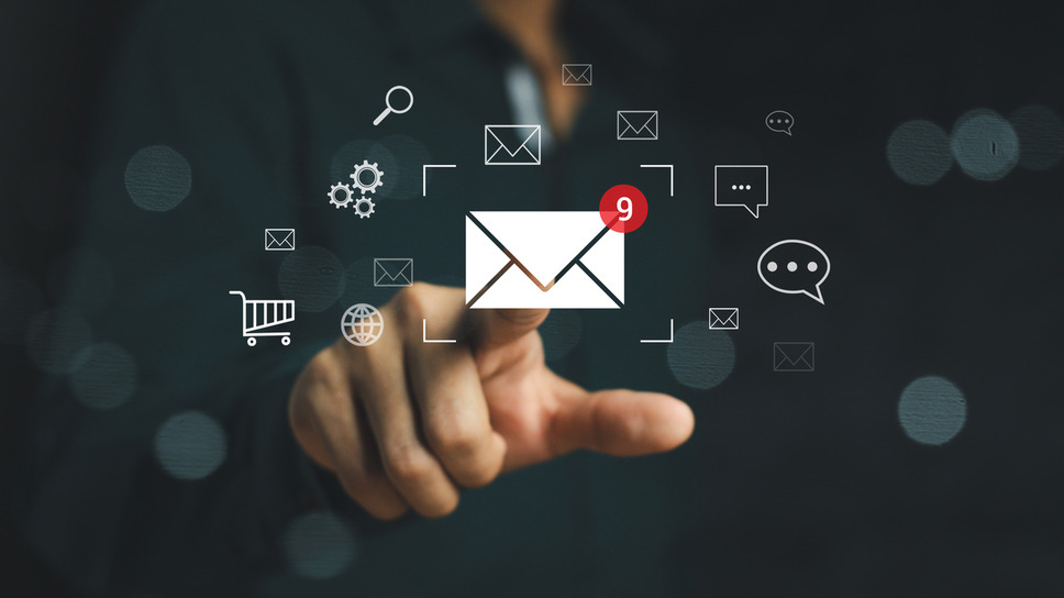 Person interacting with digital strategy icons on virtual interface, depicting success with email marketing agency services