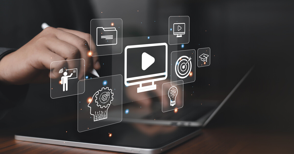 Digital content icons displayed over a laptop, illustrating HubSpot Content Hub and content management best practices.
