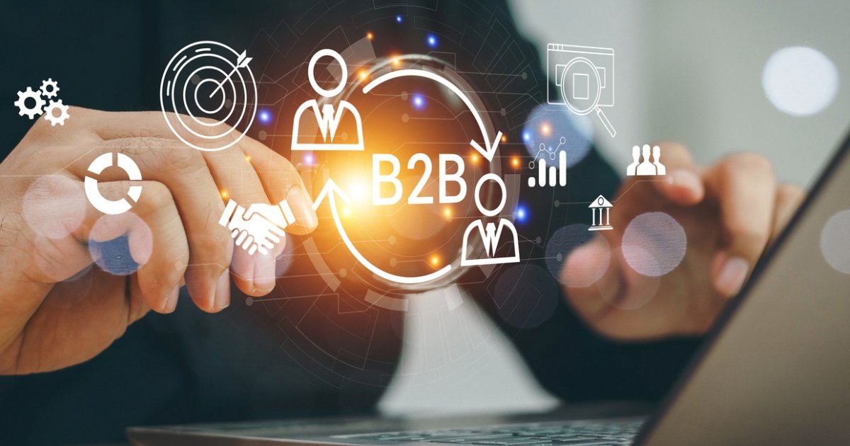 Professional using laptop, leveraging digital agency strategies for B2B digital brand health measurement and improvement