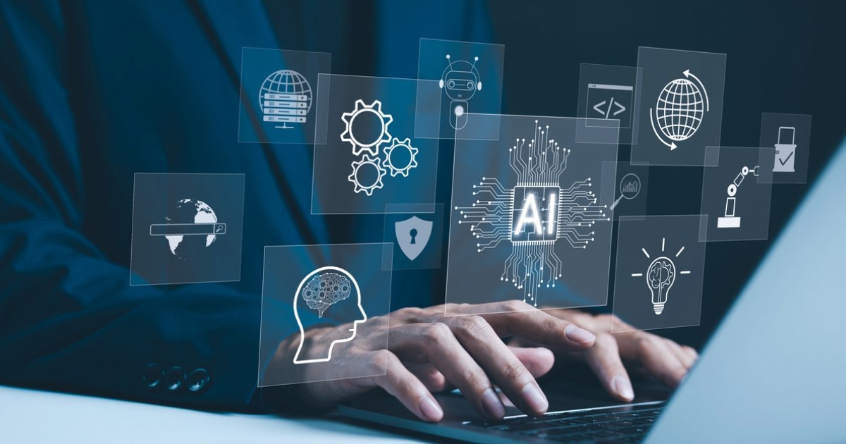 Person using laptop, exploring SitecoreAI capabilities and implementation services for scalable site management solutions