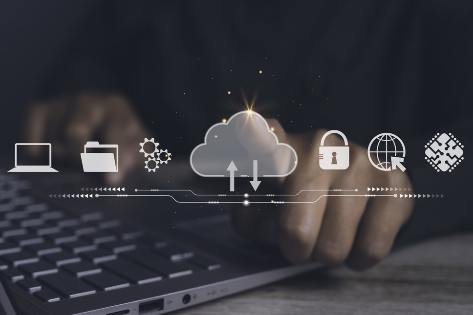 Cloud computing concept with system and security icons on a laptop, resembling success with Sitefinity hosting agency services