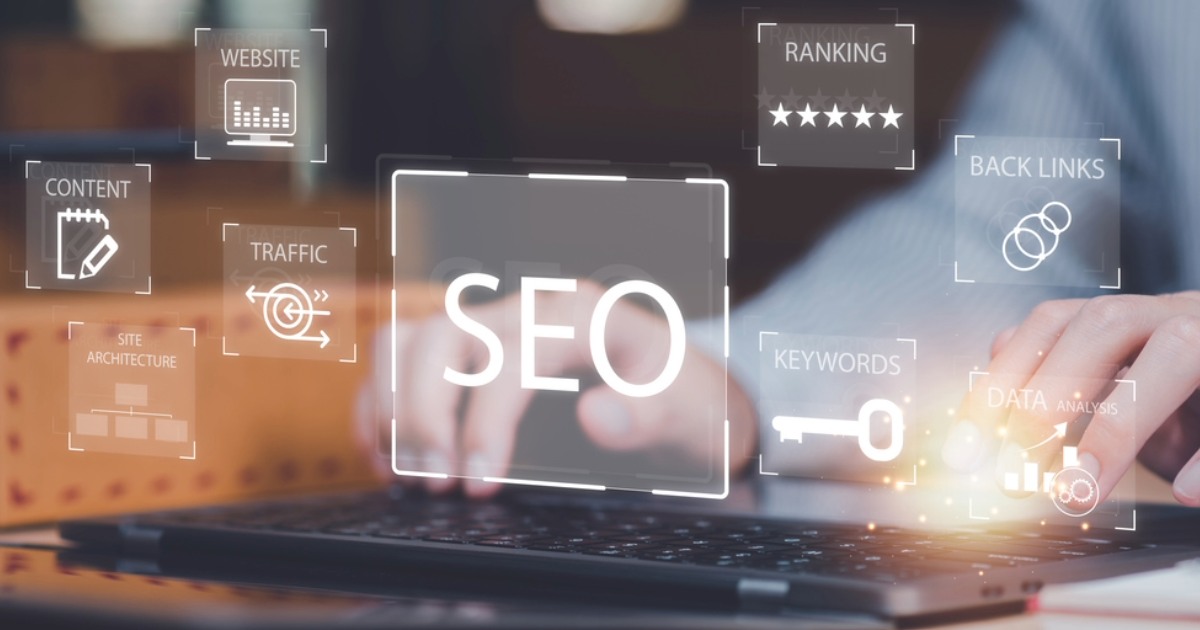 Professional using a laptop, optimizing Ecommerce sales by applying effective SEO strategies