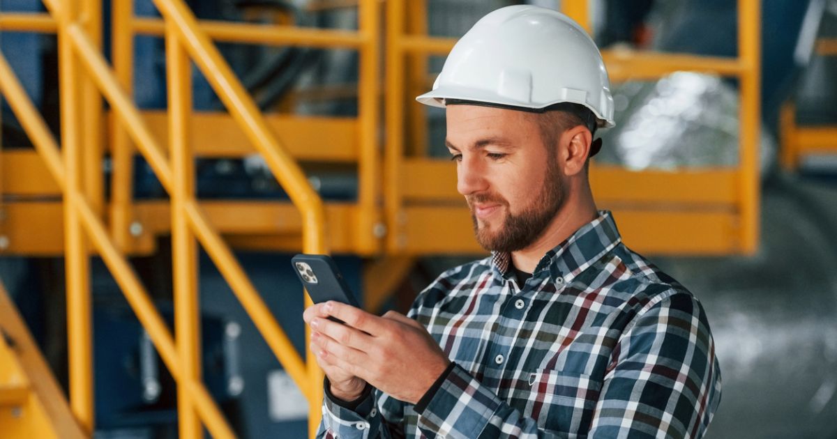 Industrial professional utilizing social media platforms to drive business results with support from digital agency services