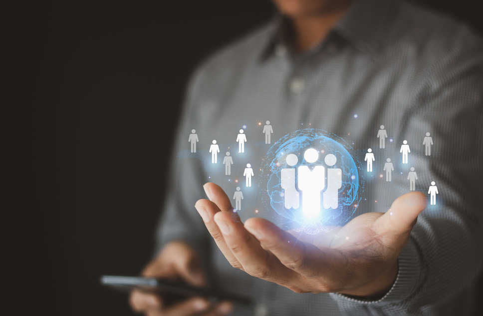 person holding global network, symbolizing worldwide digital connectivity and business success with inclusive digital services