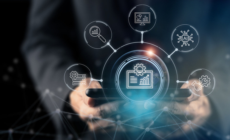 Person viewing predictive data analytics on device, representing business intelligence solutions with digital agency services