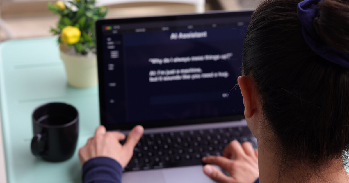 Person with laptop using an AI assistant interface for AI copywriting, content generation, and digital marketing automation.