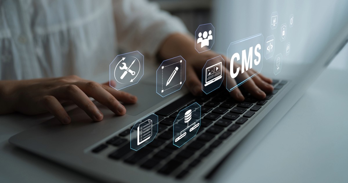 Person using a laptop exploring CMS features, representing Drupal content management and website development agency success
