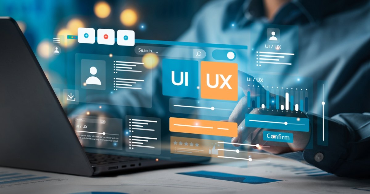 Person interacting with UI/UX design interface using a laptop, representing success with website design agency services 