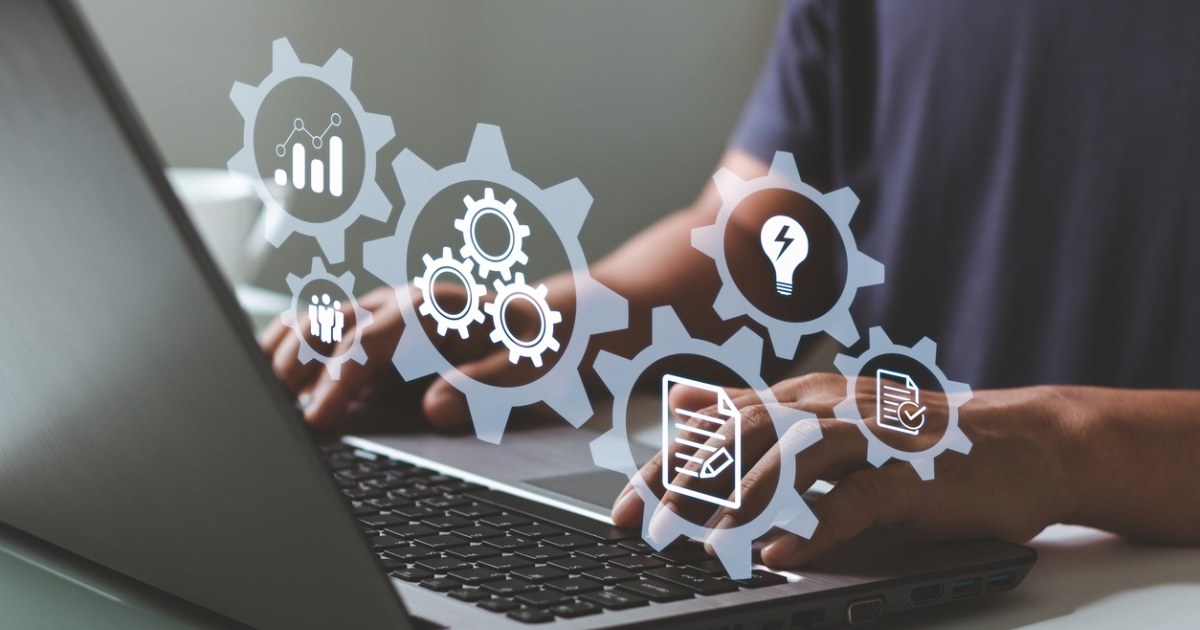 User leveraging WordPress automation capabilities on laptop, representing business success with WordPress agency services