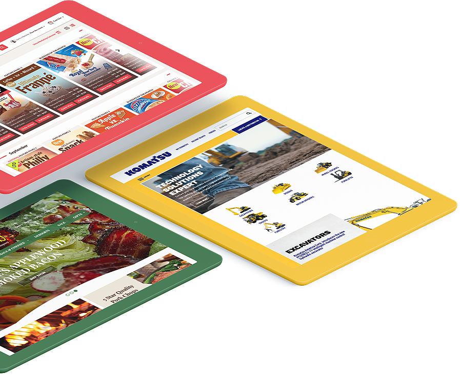 Previous website design projects by Americaneagle.com digital agency teams with web design examples on tablets