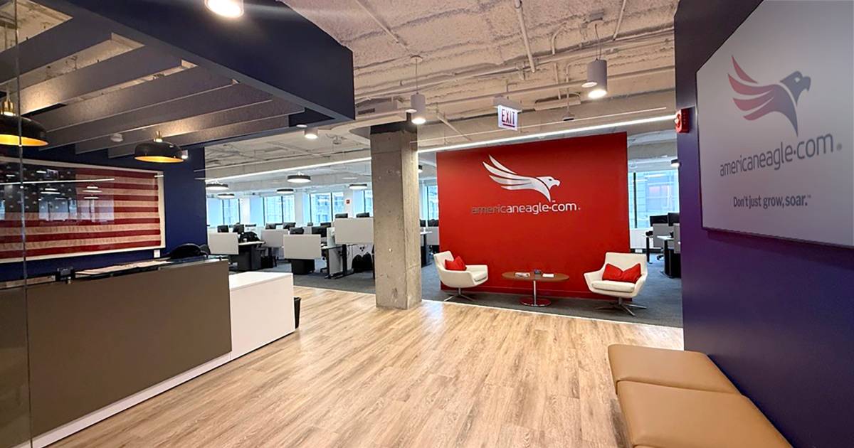 Office lobby with Americaneagle.com branding and seating area, reflecting modern interior at web agency office in Chicago, IL