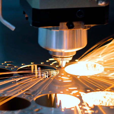 Industrial laser cutting metal, reflecting business success with digital marketing strategies for manufacturers
