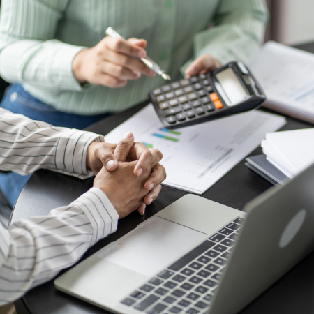 Banking professionals reviewing data, highlighting success with financial services website design and development agency