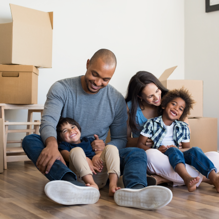 image of happy family moving into a new home, indicating success with website development agency for b2b relocation services