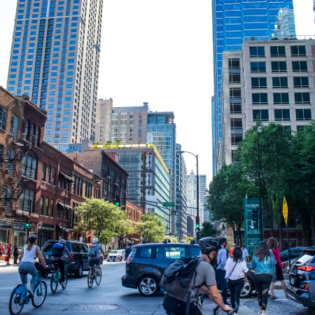 Bustling city street with pedestrians, indicating census research success with digital agency services for education